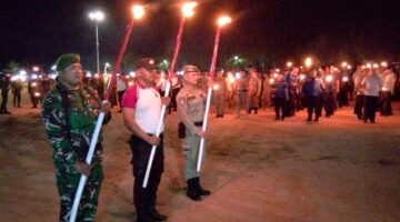Sinergi Kawal Kamtibmas, Koramil 01/AK Sukseskan Upacara Taptu dan Pawai Obor HUT Ke-81 RI di Labura
